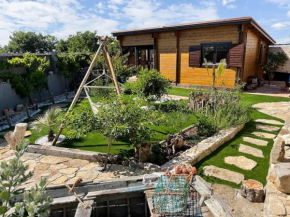 Casa em madeira com jardim privado